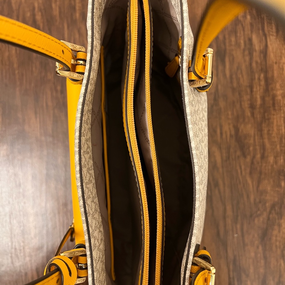 Used great condition MK purse. Yellow/mustard and ivory color. Medium sized. - Picture 3 of 5